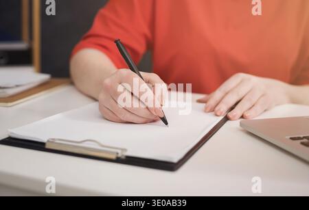 Business woman working with documents in office Stock Photo