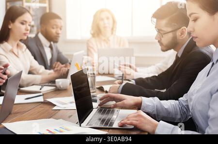 Programmers working in software developing company Stock Photo