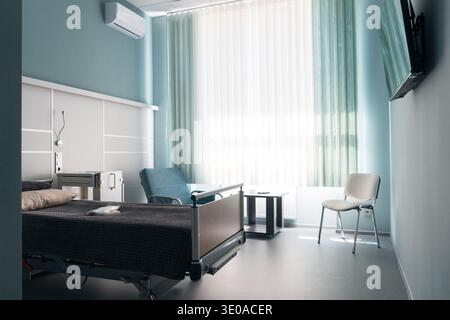 empty patient room with modern interior in hospital Stock Photo