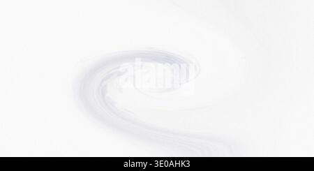 A gentle, purple-hued swirling motif on a white background, producing a soft and calming visual effect with delicate coloration Stock Photo