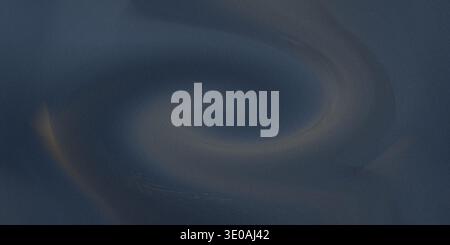 A dark blue abstract background featuring a swirling vortex with golden highlights and subtle gradient effects, creating a sense of depth and movement Stock Photo