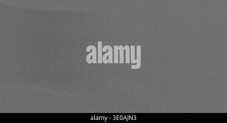 A close-up, full-frame image displaying a dark gray surface characterized by a fine, uniform grain or noise pattern. The texture is consistent across Stock Photo