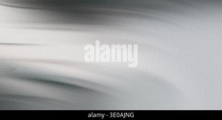 This image features a grey textured background with wavy lines and shadows, creating a dynamic and visually interesting composition with a range of gr Stock Photo
