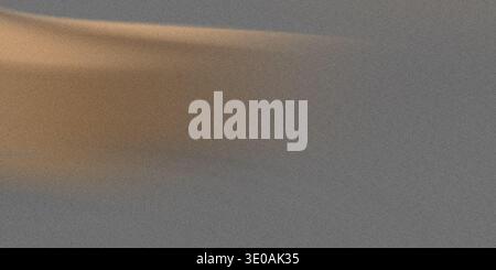 An abstract, close-up view of a textured surface, predominantly dark gray with fine speckles, featuring a soft, warm, yellowish-orange light gradient Stock Photo