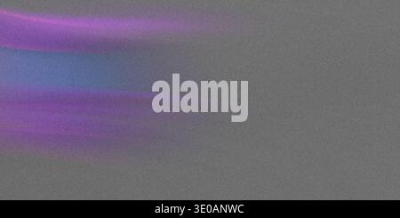 A grainy gray background overlaid with a dynamic horizontal streak of bright purple and blue color concentrated on the left side, suggesting motion or Stock Photo