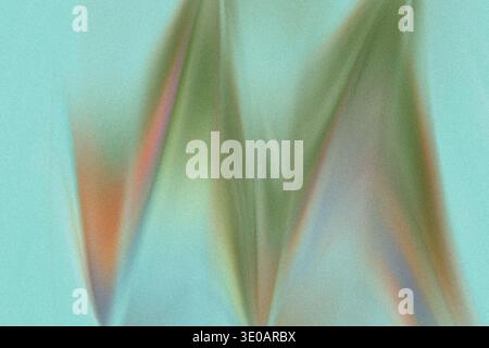 An abstract composition set against a grainy, light teal or aqua background. Blurred, multi-colored shapes resembling sharp zigzags or peaks dominate Stock Photo