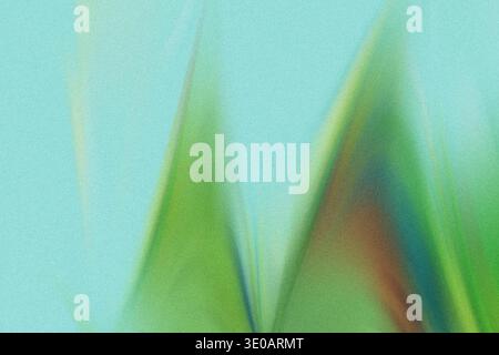 An abstract, grainy image featuring soft, blurred shapes in shades of green and teal against a textured blue-green background, suggesting foliage or p Stock Photo