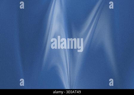 A close-up, abstract image featuring a deep blue, textured surface, possibly fabric or felt, with bright, wavy streaks of light creating dynamic shado Stock Photo