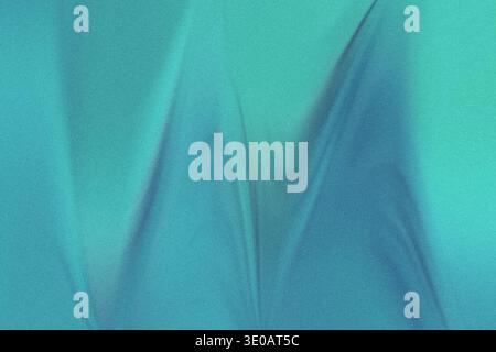 An abstract macro shot of a textured surface displaying a gradient from teal to turquoise. The material shows gentle folds and shadows, giving it a se Stock Photo