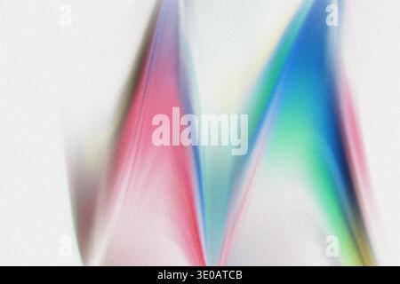 An abstract digital artwork featuring vibrant, colorful light streaks that converge to form an 'M' shape or two opposing peaks. The image has a distin Stock Photo