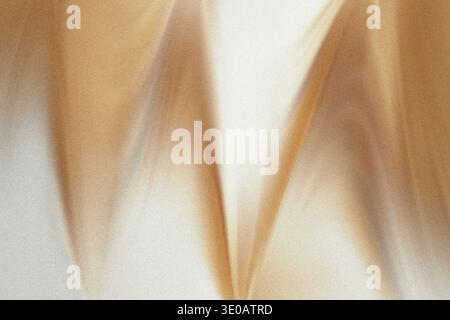 A highly textured, abstract background featuring warm gold tones blending into bright white areas. Wavy, soft light patterns create dynamic, almost fa Stock Photo