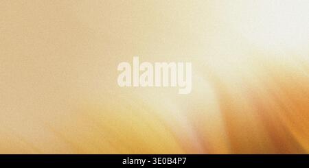 A golden textured background with a soft gradient creates a warm and inviting abstract design Stock Photo