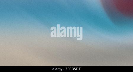 A grainy abstract background showcases a gradient of blue and gray, highlighted by a soft red blur in the upper right corner Stock Photo