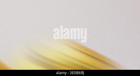 A textured light gray background with blurred yellow and gold streaks creating a dynamic and abstract pattern Stock Photo