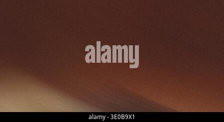 A dark brown gradient texture creates an abstract background with a grainy and noisy effect Stock Photo