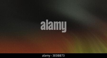 A textured dark background with hints of orange and green creates a moody and abstract surface Stock Photo