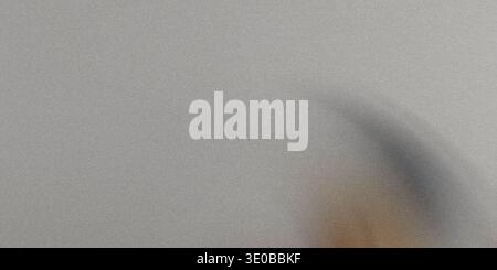 A subtle gray grainy texture creates a versatile abstract background with a rough, vintage feel Stock Photo