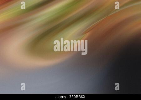 A swirling abstract background features a gradient of brown, beige, and green colors with a smooth, textured pattern Stock Photo