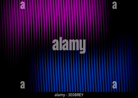 Abstract background with vertical lines in vibrant shades of magenta and blue, creating a futuristic and dynamic visual Stock Photo