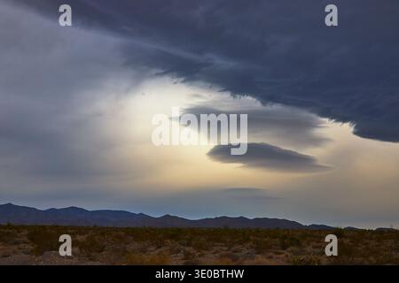 Storm Clouds and Dramatic Sky Over Nevada Desert Landscape Stock Photo