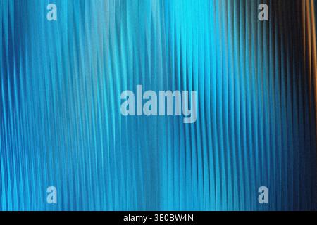 Abstract blue textured background with vertical lines and a subtle gradient from bright blue to dark blue Stock Photo