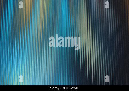 Abstract vertical lines of blue, gold, and black create a textured, rippled effect, suggesting movement and depth Stock Photo