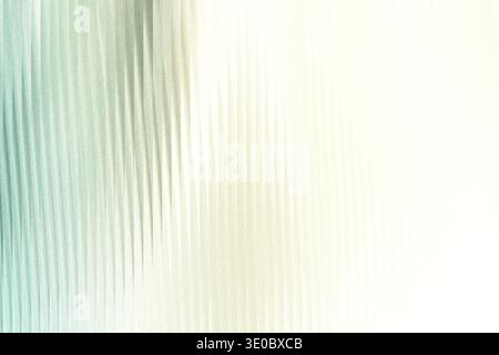 A soft, textured background with vertical lines fading from a cool teal to a bright, warm white, creating a gentle gradient effect Stock Photo