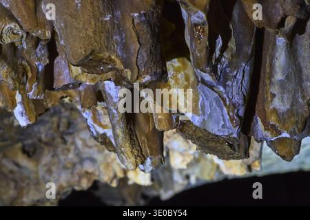 Macro Cave Formation Texture and Mineral Detail in Subterranean Environment Stock Photo