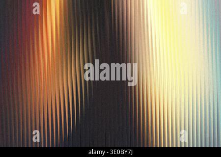 Vertical ribbed glass texture with warm light creating a gradient of colors from dark brown to bright yellow and blue Stock Photo