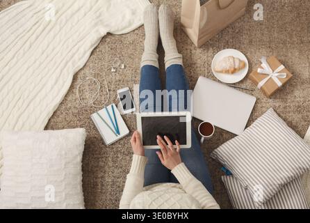 Woman using blank digital tablet Stock Photo