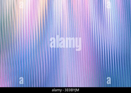 A shimmering abstract background with vertical lines of pastel colors, blending from soft green and pink to vibrant blue and purple hues, creating a s Stock Photo