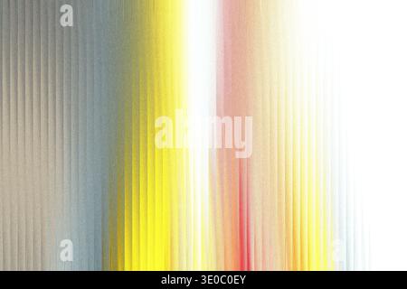 Abstract vertical lines of color transition from gray to yellow and red, creating a vibrant and dynamic visual effect with a grainy texture Stock Photo
