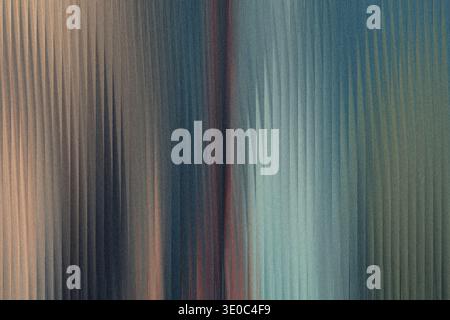 Abstract vertical lines with a gradient of colors from beige to blue and hints of red, creating a textured and artistic background Stock Photo
