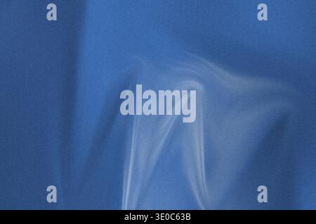 This image showcases a blue fabric texture with a white smoke or fog effect on the surface creating a unique and intriguing visual effect with subtle Stock Photo