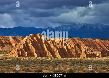 Cathedral Gorge Eroded Clay Formations and Desert Landscape with Stormy Mountains Nevada Stock Photo