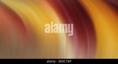 A blurred image featuring a blend of warm autumnal colors in a swirling pattern, creating an abstract and artistic effect. Stock Photo