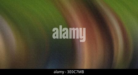 An image featuring a blurred abstract background with dominant green and brown tones creating a smooth, flowing effect. The colors blend seamlessly. Stock Photo