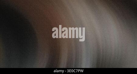 An image featuring a blurred abstract background with a gradient of brown and gray tones. The effect creates a smooth, hazy visual texture. Stock Photo