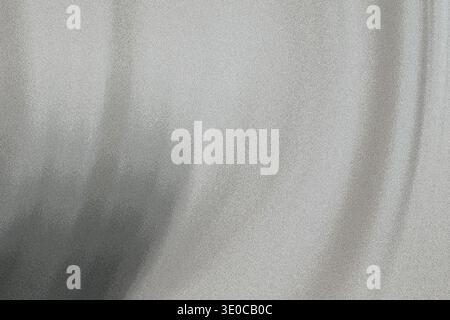 The image shows a blurred, out-of-focus close-up of a light-colored fabric exhibiting a gradient from light gray to darker gray. The texture is soft a Stock Photo