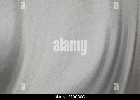 A detailed image showcasing the texture of a light gray fabric. The fabric shows subtle wrinkles and drapes, highlighting its soft and possibly lightw Stock Photo