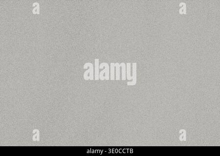 A close-up shot reveals a light gray textured background. The texture is subtle, with slight variations in shade creating a slightly mottled appearanc Stock Photo