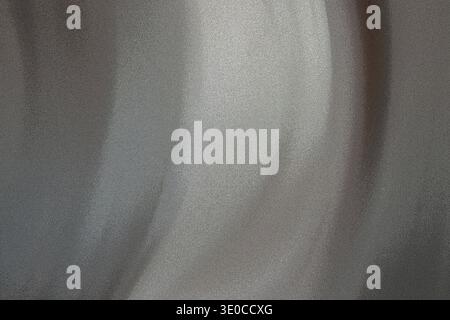 A close-up shot reveals the subtle texture and folds of a light-colored fabric, showcasing a soft, blurred effect and a predominantly off-white and gr Stock Photo