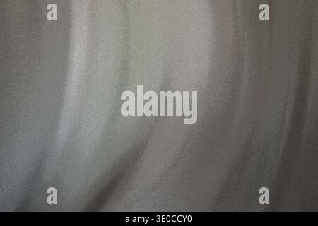 The image shows a detailed close-up of a light gray or off-white fabric exhibiting vertical folds and drapes. The texture appears soft and possibly sl Stock Photo