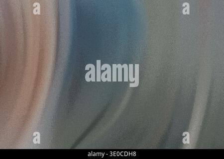 An image featuring a blurred abstract background with a soft gradient of pastel colors, transitioning from peach to teal and grey. The texture is smoo Stock Photo