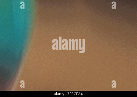 An out of focus image showcasing a vibrant teal color sharply contrasting against a muted brown background. The color transition is smooth and creates Stock Photo