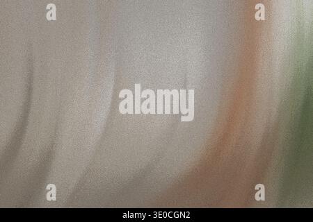 An out of focus image showing a predominantly beige background with blurred streaks of orange and green. The texture appears slightly wrinkled or crea Stock Photo