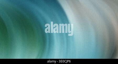 A blurred image featuring a swirling blend of teal, green, and gray tones creating a smooth, abstract effect. Stock Photo