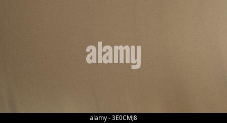 A simple, high-resolution image featuring a solid taupe background. Suitable for various design applications needing a neutral backdrop. Stock Photo