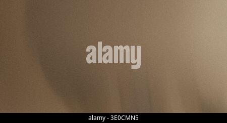 A high-resolution image featuring a muted taupe background with a subtle, almost imperceptible texture. The color is consistent throughout. Stock Photo