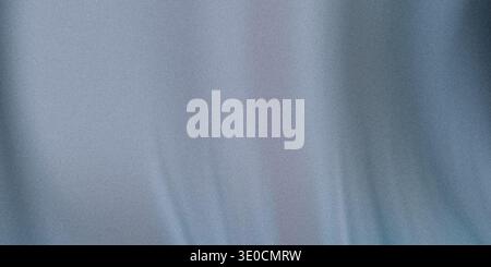 A blurry image showcasing a soft blue fabric with subtle folds and drapes creating a muted, textured background. Stock Photo